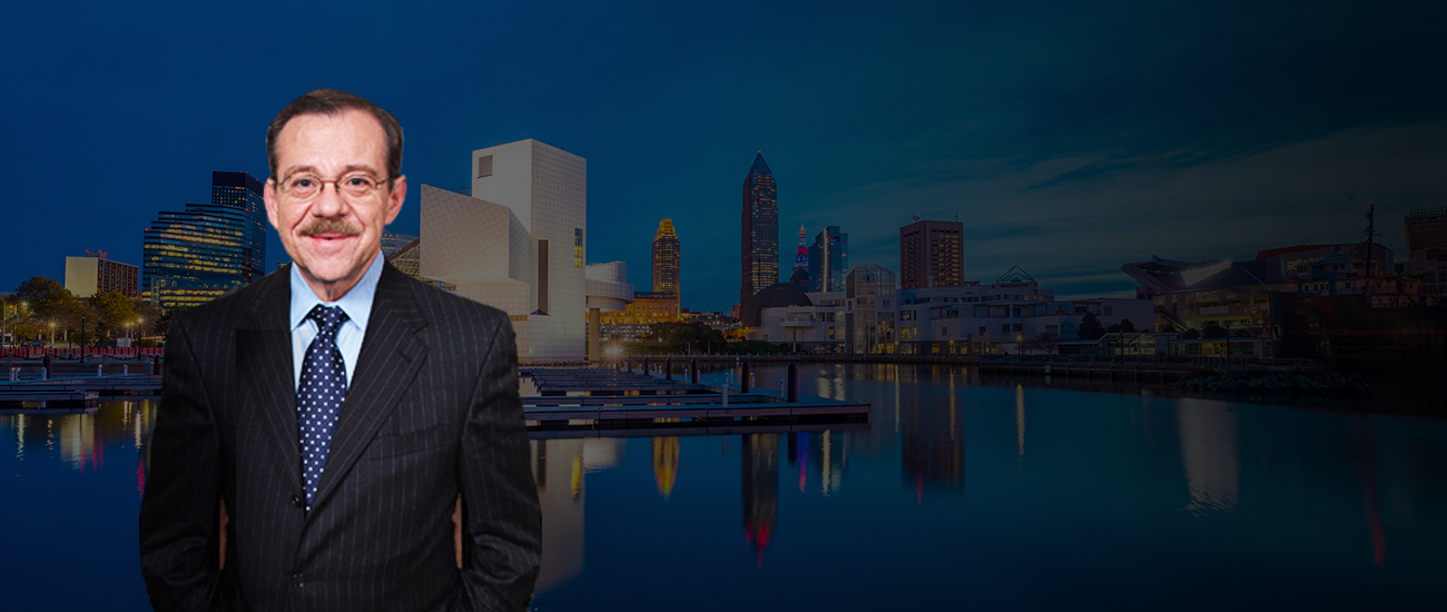 Attorney from Rubin Guttman & Associates Over Cleveland Skyline